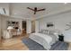 Main bedroom with desk and serene view of bath area at 2211 E Camelback Rd # 402, Phoenix, AZ 85016
