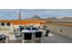 Outdoor patio with comfortable seating overlooking a mountain range, perfect for relaxing at 2211 E Camelback Rd # 402, Phoenix, AZ 85016