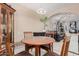 Warm dining room with open access to the living area, perfect for Gathering gatherings at 2306 E Burgess Ln, Phoenix, AZ 85042