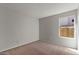 Bedroom with window and neutral-colored walls at 2313 E Gondola Ln, Gilbert, AZ 85234