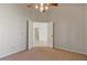 View of the bedroom's entry way with neutral walls and carpet at 2313 E Gondola Ln, Gilbert, AZ 85234