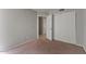 Bedroom with an open doorway, closet, and neutral colored walls and carpet at 2313 E Gondola Ln, Gilbert, AZ 85234