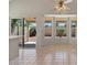 A sunlit dining area features sliding glass door and bay window at 2313 E Gondola Ln, Gilbert, AZ 85234