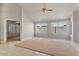 Bright living room featuring tile floors, vaulted ceilings, and a cozy atmosphere at 2313 E Gondola Ln, Gilbert, AZ 85234