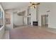 Expansive living area with vaulted ceilings, tile floors, a fireplace, and neutral paint at 2313 E Gondola Ln, Gilbert, AZ 85234