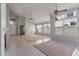 Bright living room boasts tile floors, vaulted ceilings, and lots of natural light at 2313 E Gondola Ln, Gilbert, AZ 85234