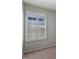 Bright room featuring a double window with white frame and adjustable horizontal blinds at 2313 E Gondola Ln, Gilbert, AZ 85234