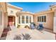 Private courtyard features stylish seating area, covered entry and lots of natural light at 23216 N Gaviota Dr, Sun City West, AZ 85375