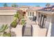 Covered courtyard with space for seating and desert landscaping in a quaint and private space at 23216 N Gaviota Dr, Sun City West, AZ 85375
