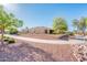 Attractive single-story home with a well-maintained yard and sidewalk, showcasing the property's curb appeal at 23216 N Gaviota Dr, Sun City West, AZ 85375
