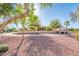 Lush desert landscaping frames this single-story home, showcasing the property's inviting outdoor space at 23216 N Gaviota Dr, Sun City West, AZ 85375