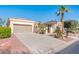 Charming single-story home boasts a well-manicured yard and attached two-car garage at 23216 N Gaviota Dr, Sun City West, AZ 85375