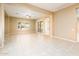 Large living room featuring natural light, open floor plan and access to the outdoors at 23216 N Gaviota Dr, Sun City West, AZ 85375