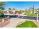 Street view showcasing the home's manicured lawn and desert landscape that complements the neighborhood at 23216 N Gaviota Dr, Sun City West, AZ 85375