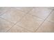 Beige tile flooring with subtle variations in color and texture laid out in a grid pattern with grout lines at 23216 N Gaviota Dr, Sun City West, AZ 85375