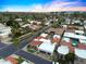 An impressive aerial view displays a vibrant neighborhood featuring lovely homes with a nearby golf course at 2421 E Montebello Ave, Phoenix, AZ 85016