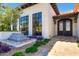 Front exterior of single-Gathering home featuring a custom tiled staircase and beautifully landscaped yard at 2421 E Montebello Ave, Phoenix, AZ 85016