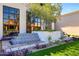 Close-up of the custom tiled staircase, greenery, and large windows at 2421 E Montebello Ave, Phoenix, AZ 85016