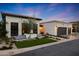 Charming single-Gathering home with landscaped yard, tiled steps, modern windows, and a beautiful tree at 2421 E Montebello Ave, Phoenix, AZ 85016