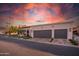 Charming home featuring desert landscaping, a two-car garage, and a beautiful terracotta tile roof at 2421 E Montebello Ave, Phoenix, AZ 85016