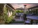 Outdoor lounge area with fire pit and ample seating for entertaining at 2421 E Montebello Ave, Phoenix, AZ 85016
