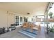 Inviting patio area with a dining set, perfect for enjoying outdoor meals near the pool at 2424 E Aster Dr, Phoenix, AZ 85032