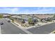 Street view of a single-Gathering home with a well-maintained lawn and a modern exterior design at 24540 N 144Th Ave, Surprise, AZ 85387