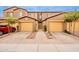 Inviting townhome with a private courtyard entry and two-car garages at 250 W Queen Creek Rd # 206, Chandler, AZ 85248