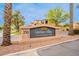 Community sign for Carino Villas Condominiums near Scottsdale, Arizona, under a blue sky at 250 W Queen Creek Rd # 206, Chandler, AZ 85248