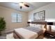 A stylish bedroom with a modern bed frame, sleek nightstands, and a minimalist aesthetic at 2502 E Malibu Dr, Tempe, AZ 85282