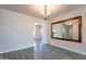 Dining area featuring a chandelier, gray floors, and an archway to another room at 2502 E Malibu Dr, Tempe, AZ 85282
