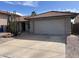 Single story home with desert landscaping and a two car garage at 2705 E Rock Wren Rd, Phoenix, AZ 85048