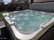 Close-up of a crystal-clear hot tub with multiple jets and seating areas, ready for relaxation at 2705 E Rock Wren Rd, Phoenix, AZ 85048