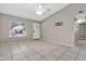 Spacious living room featuring neutral walls, tile flooring, and plenty of natural light, perfect for relaxation at 2741 S Brooks --, Mesa, AZ 85202