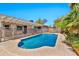 Backyard swimming pool featuring secure fencing, landscaping, and a bright sunlit patio at 2741 S Brooks --, Mesa, AZ 85202