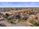 Expansive property featuring a tile roof, lush landscaping, pool, and circular driveway at 2782 E Citadel Ct, Gilbert, AZ 85298