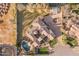 Aerial view of property featuring tile roof, pool, manicured landscaping, and outdoor living spaces at 2782 E Citadel Ct, Gilbert, AZ 85298