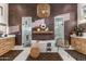 Stunning bathroom with double vanities, a soaking tub, glass showers and designer finishes throughout at 2782 E Citadel Ct, Gilbert, AZ 85298