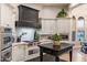 Elegant kitchen featuring stainless steel appliances, custom cabinetry, and an island with seating at 2782 E Citadel Ct, Gilbert, AZ 85298