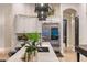 Bright kitchen showcasing modern stainless steel appliances, custom cabinets, and a large kitchen island at 2782 E Citadel Ct, Gilbert, AZ 85298