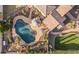 Aerial shot highlighting a kidney-shaped pool with rock features and an outdoor seating area at 2782 E Citadel Ct, Gilbert, AZ 85298
