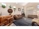 Living room boasting a wooden bar, tall ceilings, clerestory windows, and inviting decor at 2841 S Esmeralda Cir, Mesa, AZ 85212