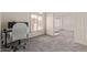 Inviting bedroom with carpet, two windows with shutters, and a glimpse into the next room at 2904 E Ludlow Dr, Phoenix, AZ 85032