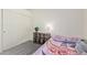 Small bedroom features closet, carpeting and neutral walls for a serene and inviting atmosphere at 2904 E Ludlow Dr, Phoenix, AZ 85032