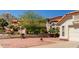 Charming single-Gathering home with desert landscaping, tile roof, and attached two-car garage at 2904 E Ludlow Dr, Phoenix, AZ 85032
