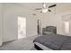 View of main bedroom featuring ceiling fan, access to main bathroom, and walk-in closet at 2904 E Ludlow Dr, Phoenix, AZ 85032