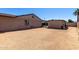 Gravel-covered backyard with a building at 3301 E Sharon Dr, Phoenix, AZ 85032