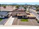 Charming home with an extended driveway, desert landscaping, and mountain views at 3301 E Sharon Dr, Phoenix, AZ 85032