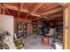 Organized garage space with shelving, storage, and ample room for projects at 3301 E Sharon Dr, Phoenix, AZ 85032