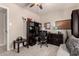 This expansive home office features plenty of storage, a desk, and a bright workspace at 3301 E Sharon Dr, Phoenix, AZ 85032